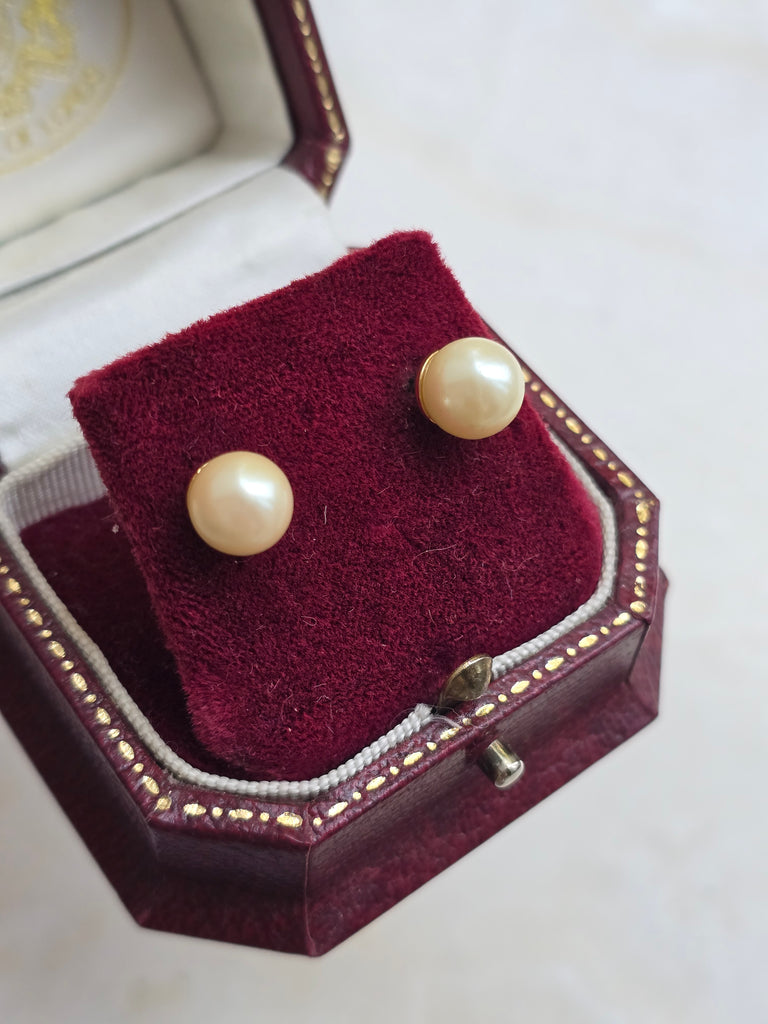 Faux pearl stud earrings