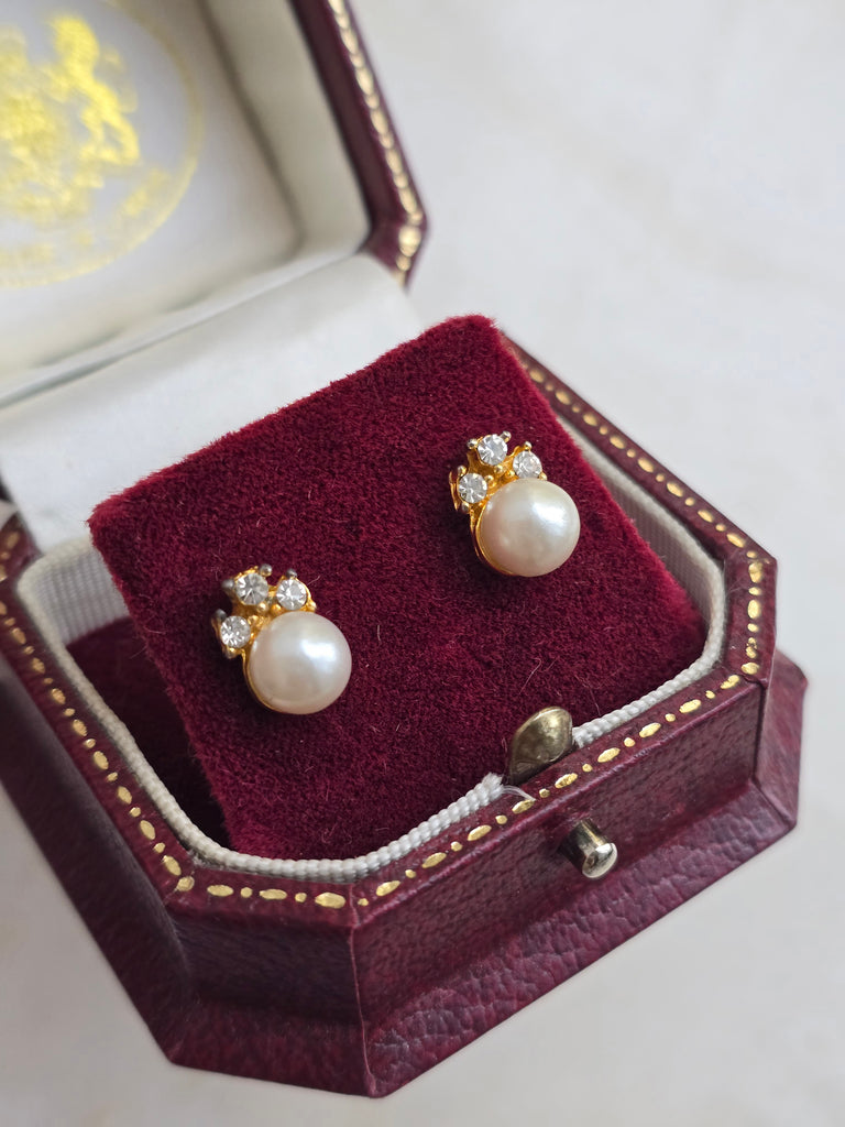 Tiny faux pearl stud earrings