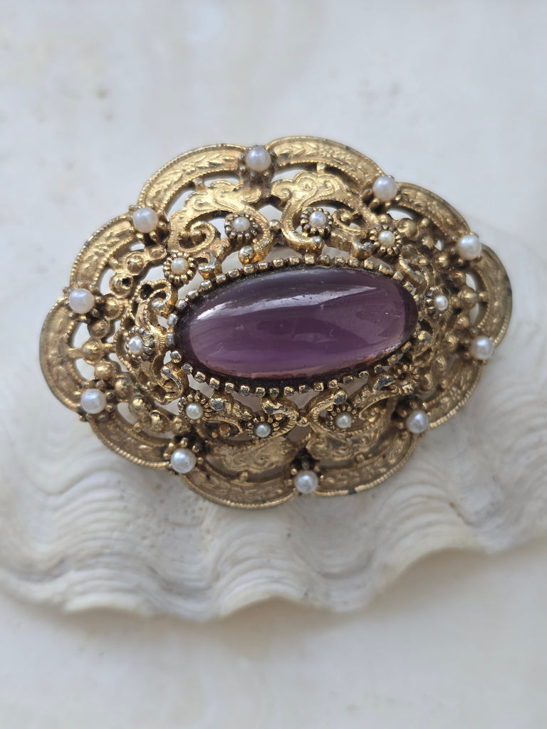 Vintage Sphinx brooch with cat eye stone