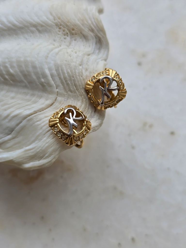 Gold tone Nina Ricci clip on earrings