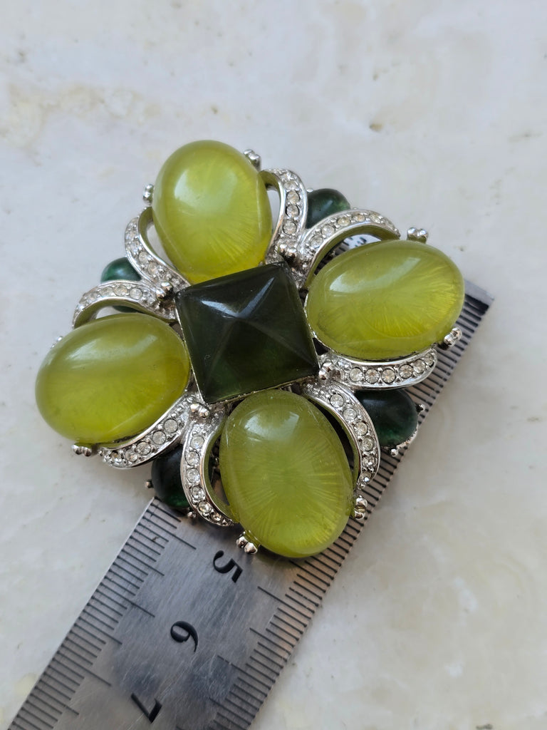 Vintage Joan Rivers green lucite brooch