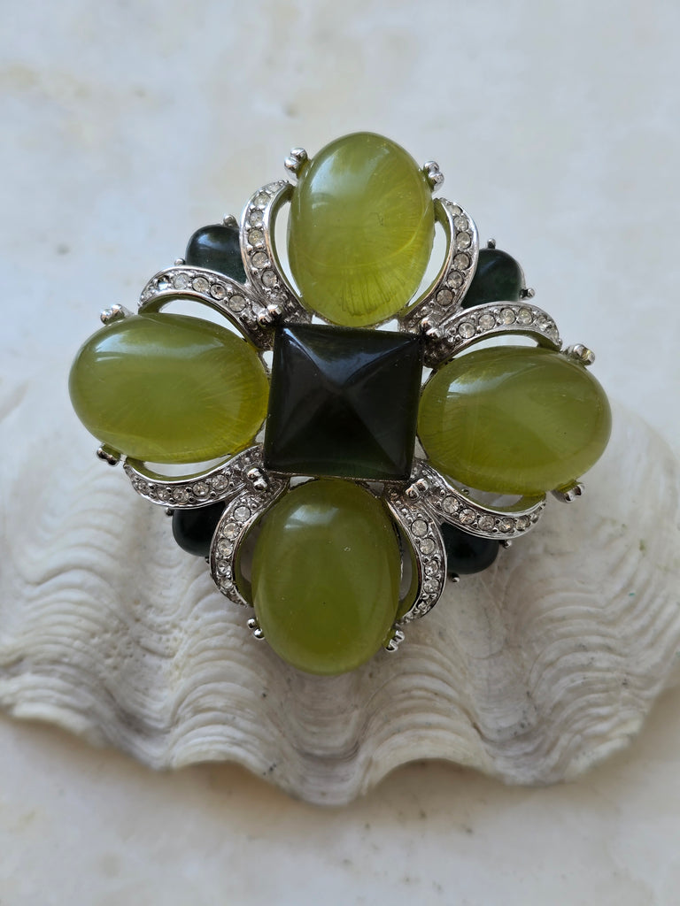 Vintage Joan Rivers green lucite brooch