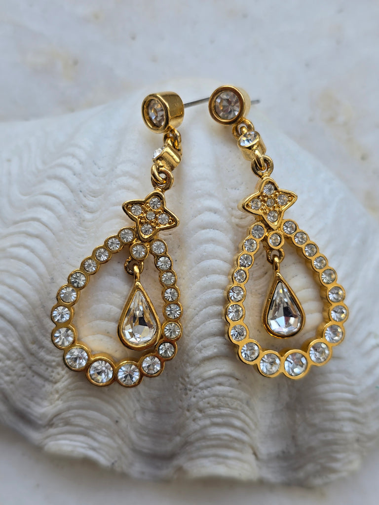 Gold tone dangle earrings