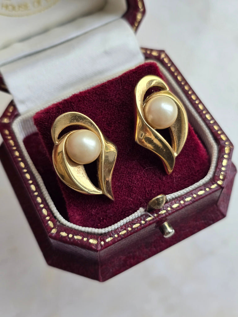 Vintage gold tone stud earrings with faux pearls